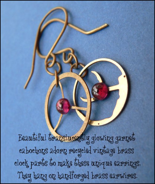 Beautiful translucently glowing garnet cabochons adorn recycled vintage brass clock parts to make these unique earrings